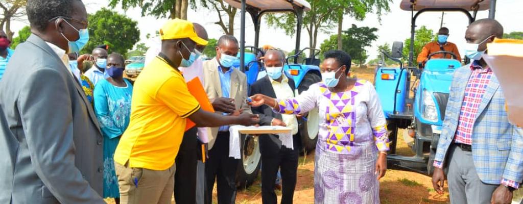 Ariengutu Cooperative from Usuk County Receiving a BIG Tractor from the H.E Jesca Alupo Epel